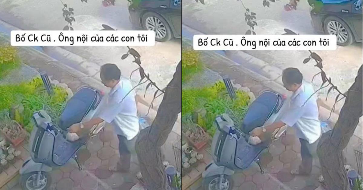 Ph&iacute;a sau clip người đ&agrave;n &ocirc;ng lớn tuổi lặng lẽ treo t&uacute;i đồ ăn ở xe