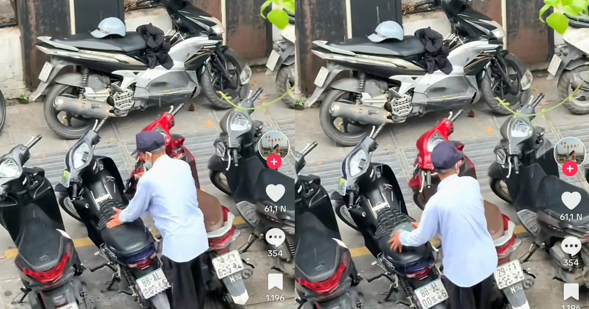 Chuyện ch&uacute; bảo vệ qu&aacute;n c&agrave; ph&ecirc; lật &uacute;p từng chiếc mũ của kh&aacute;ch khi trời mưa