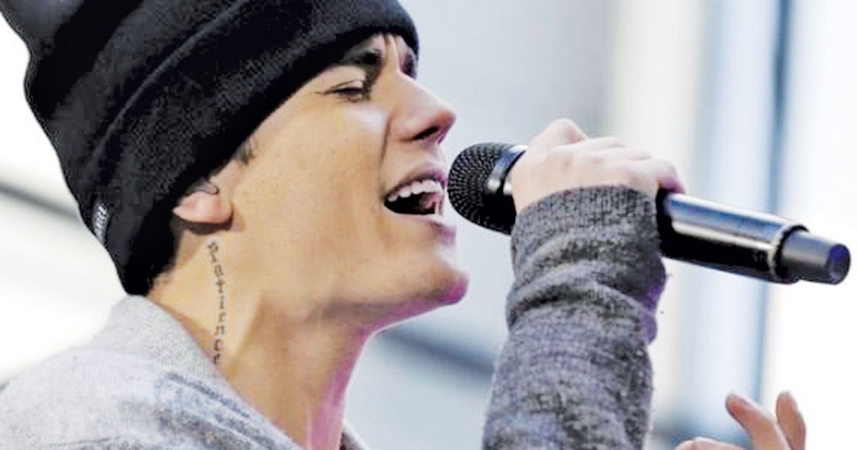 Justin Bieber cân bằng kỷ lục của John Lennon