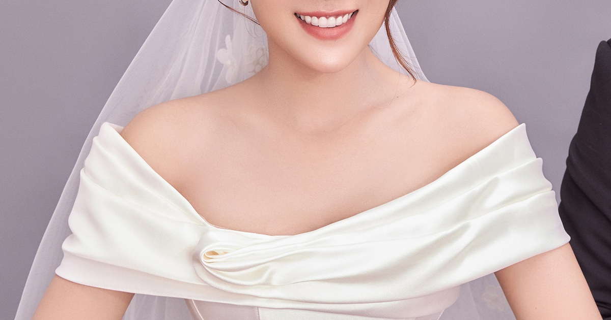 Hồ Bích Trâm diện váy cưới trắng tinh khôi khoe vai trần