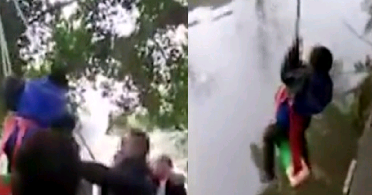 Bố treo con lơ lửng trên sông để ép con học