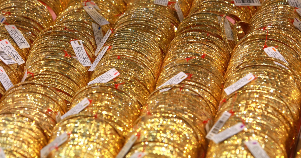 Vàng giảm giá khi chiến tranh thương mại bớt căng thẳng