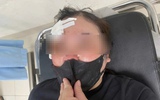 Người phụ nữ bị hành hung vì dừng xe trên đường nghe điện thoại