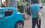 TP.HCM: Tài xế taxi công nghệ cầm dao cãi nhau trên đường khai gì tại công an?