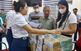 Phường Định Công chi tiền đền bù cho 19 hộ dân, có người nhận hơn 46 tỉ đồng