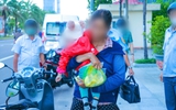 Làm rõ vụ người phụ nữ bế bé gái đi xin tiền ở Quy Nhơn