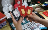 Giá vàng giảm sau vài ngày 'bất động'