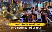 TP.HCM ngập nặng sau mưa lớn: 23 giờ đêm ăn hủ tiếu gõ chờ nước rút để về 