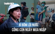 Mưa lớn, sân trường ngập sâu: Phụ huynh xắn quần, lội nước vào tận lớp đón con
