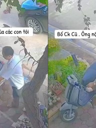 Phía sau clip người đàn ông lớn tuổi lặng lẽ treo túi đồ ăn ở xe