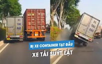 'Ớn lạnh' xe tải bị xe container chuyển làn ẩu, ép lên dải phân cách suýt lật