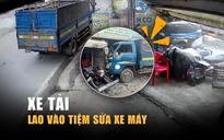 Thót tim xe tải húc gãy trụ đèn, lao vào tiệm sửa xe ở Củ Chi