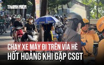 Người chạy xe máy đi trên vỉa hè đường Võ Thị Sáu hốt hoảng khi gặp CSGT