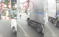 Xe máy tông đuôi xe tải vì đèn giao thông chuyển từ xanh sang đỏ đột ngột