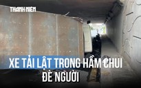 Xe tải lật trong hầm chui, đè 3 người bị thương