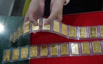 Vàng, USD biến động trái chiều