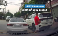 Bức xúc tài xế ngang nhiên dừng đỗ ô tô giữa đường, mặc kệ các xe khác