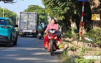 Sửa cầu Ông Lớn, xe máy nối đuôi nhau chạy ngược chiều trên đường Nguyễn Văn Linh