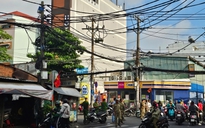 Cháy khách sạn ở TP.HCM, người dân đu dây thoát thân