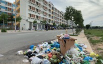 Thủ Dầu Một yêu cầu xác minh vụ 'ém' tiền khiến khu dân cư ngập rác