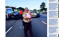 Xúc động hình ảnh cảnh sát dỗ dành bé gái gặp tai nạn