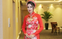 Việt Trinh đẹp rạng rỡ trong áo dài cưới