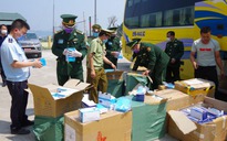 Bắt xe khách vận chuyển 30.000 khẩu trang y tế từ Việt Nam sang Lào