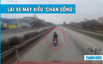 Thanh niên ‘chán sống’ lái xe máy lạng lách trước đầu xe container