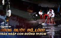 Hoang mang vì dòng nước đỏ lòm đổ về khu phố sau cơn mưa ở TP.HCM
