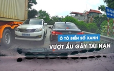 Ô tô biển xanh bị xe container 'bẻ gương' vì vượt ẩu trên cầu