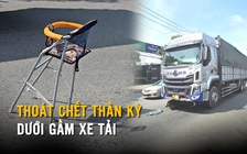 Mẹ con thoát nạn thần kỳ khi bị cuốn vào gầm xe tải