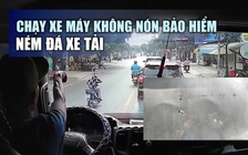 Xôn xao video người chạy xe máy không nón bảo hiểm ném đá xe tải