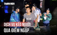 Hà Nội: Ngập sâu, mất điện, người dân bì bõm lội về nhà