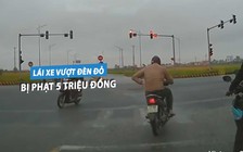 Nam thanh niên lái xe máy vượt đèn đỏ bị phạt 5 triệu, trừ 4 điểm GPLX