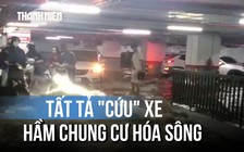 Nước mưa xối vào hầm, cư dân ở Hạ Long tất tả 'giải cứu' xe máy, ô tô