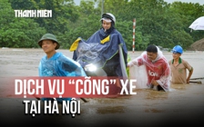 Hà Nội ngập sâu, dịch vụ xe kéo 'cõng' xe máy qua biển nước nở rộ: Giá bao nhiêu/lượt?