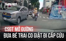 Khoảnh khắc CSGT Rạch Chiếc mở đường đưa bé trai co giật đi cấp cứu