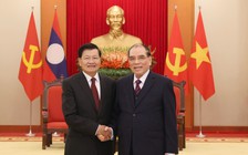 Nguyên Tổng Bí thư Nông Đức Mạnh tiếp Tổng Bí thư, Chủ tịch nước Lào