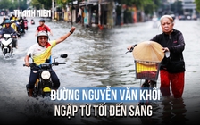 Đường Nguyễn Văn Khối ngập từ tối đến sáng, người dân chật vật dắt xe qua 'biển nước'
