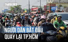Người dân lỉnh kỉnh đồ đạc quay lại TP.HCM