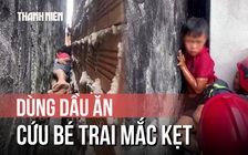 Cận cảnh cứu bé trai mắc kẹt giữa vách tường