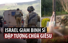 Lính Israel đập phá tượng Chúa bị bắt giam