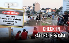 Biển cấm, dây chắn vẫn không ngăn được người vào check-in 'bãi biển Gò Vấp'