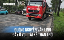 Đường Nguyễn Văn Linh ở TP.HCM đầy ổ voi, tài xế than trời