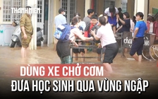 Triều cường vượt báo động 3, giáo viên dùng xe chở cơm đưa học sinh qua vùng ngập