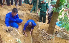 Đào đất làm vườn, phát hiện 2 hài cốt liệt sĩ