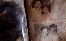 Những tấm ảnh gia đình ngả màu thời gian trong hố chôn liệt sĩ tập thể