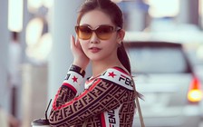 Lê Âu Ngân Anh diện đồ hiệu sang Anh nhận bằng thạc sĩ loại ưu