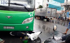 Lọt vào gầm xe khách, một phụ nữ thoát chết trong gang tấc