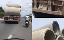 Phạt nguội tài xế xe đầu kéo chở ống bê tông mất an toàn